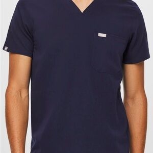 Figs Men's Navy V-Neck Short Sleeve Tee,
Unisex fit, pockets on the hips